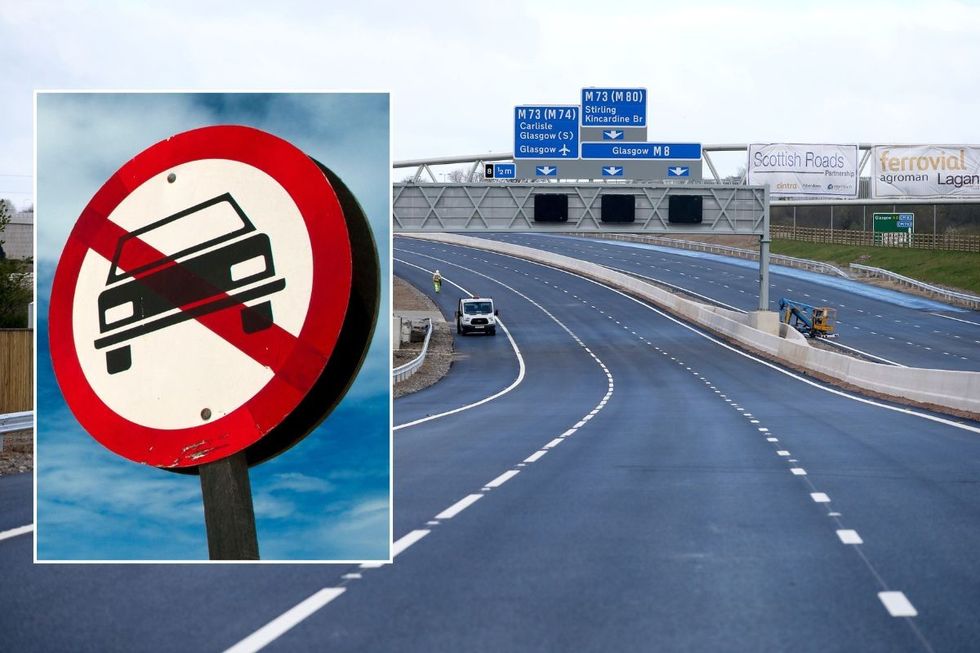 Car ban sign and a Scottish motorway