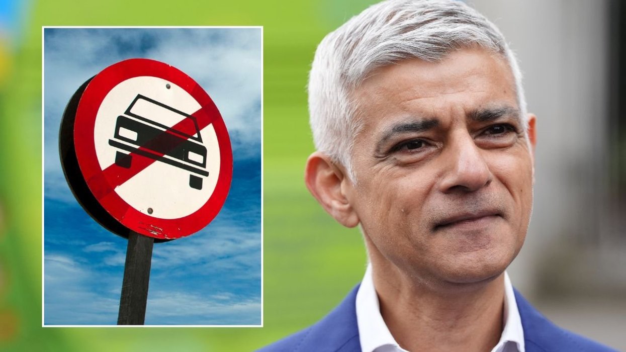 Car ban sign and London Mayor Sir Sadiq Khan