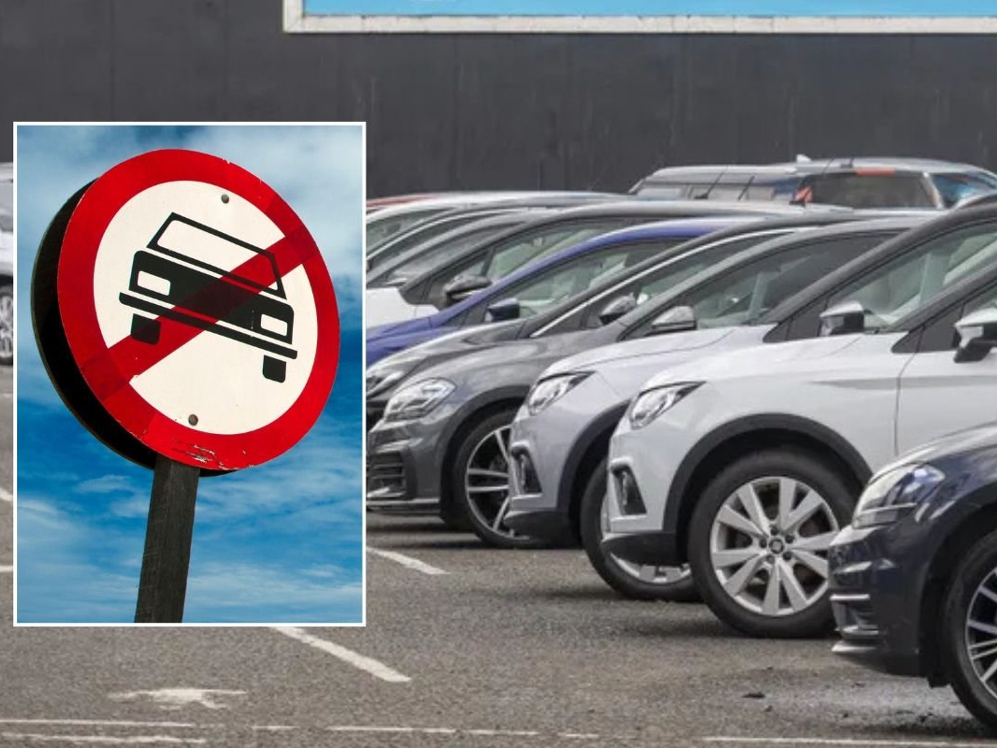 Car ban sign and vehicles parked