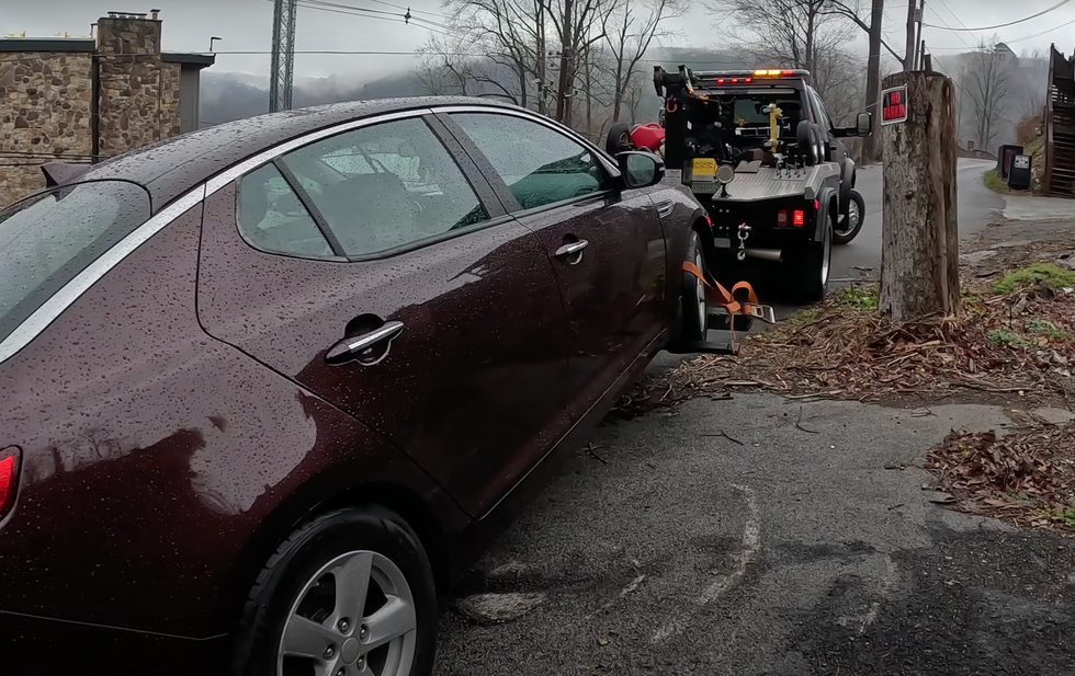 Car being towed away