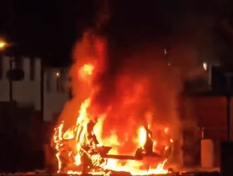 Car bomb in Dunmurry in flames
