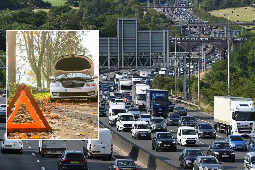 Car breakdown and busy motorway traffic