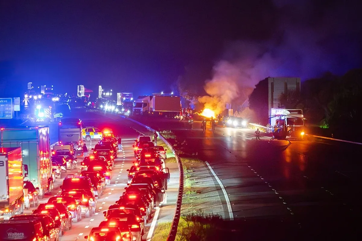 Car bursts into fireball after flipping onto back as motorway shut