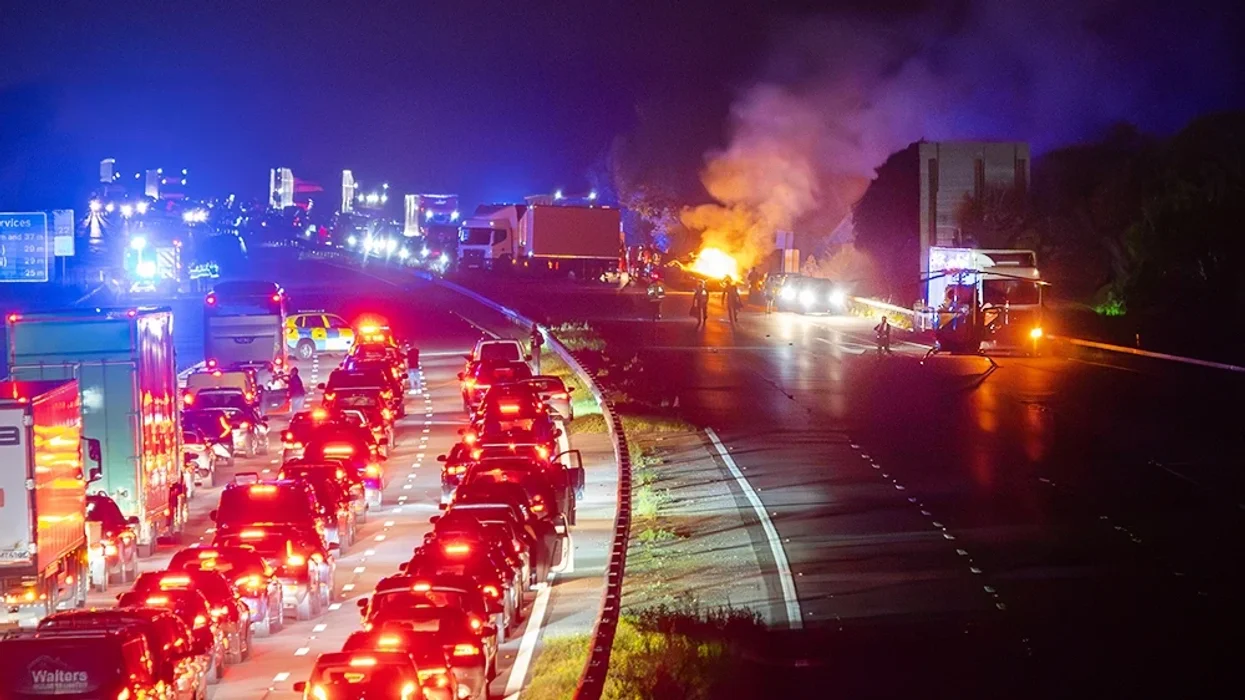 Car bursts into fireball after flipping onto back as motorway shut