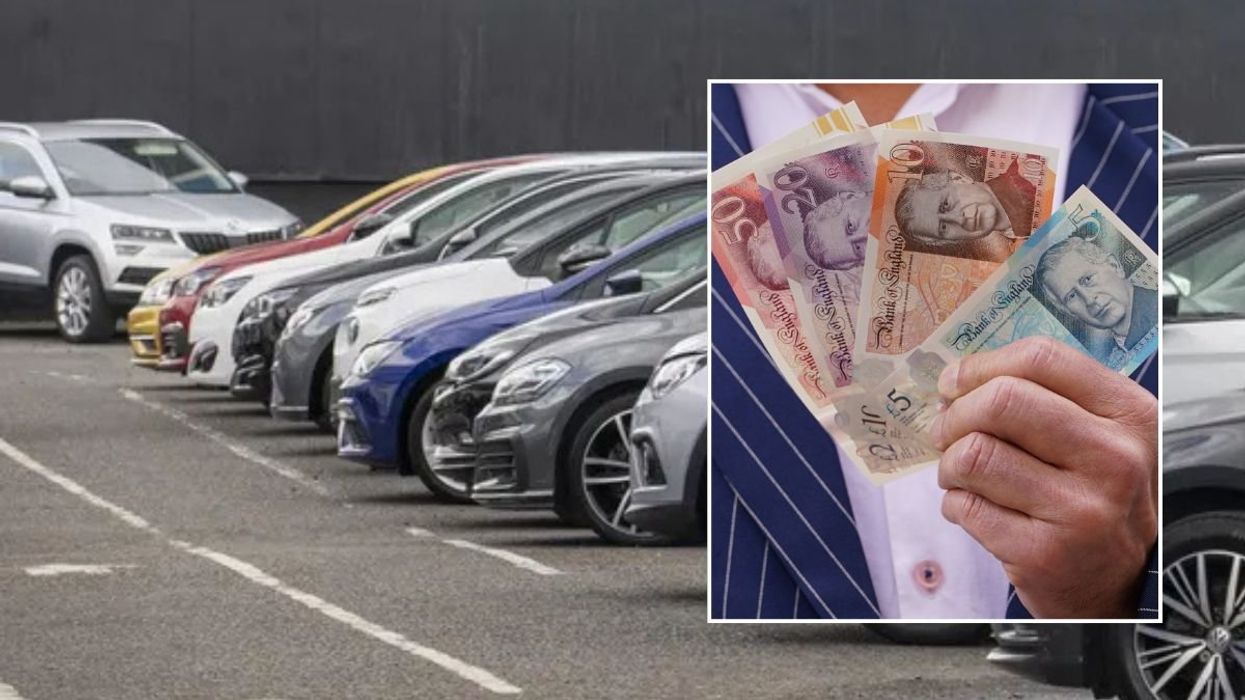 Car dealership and a man holding cash