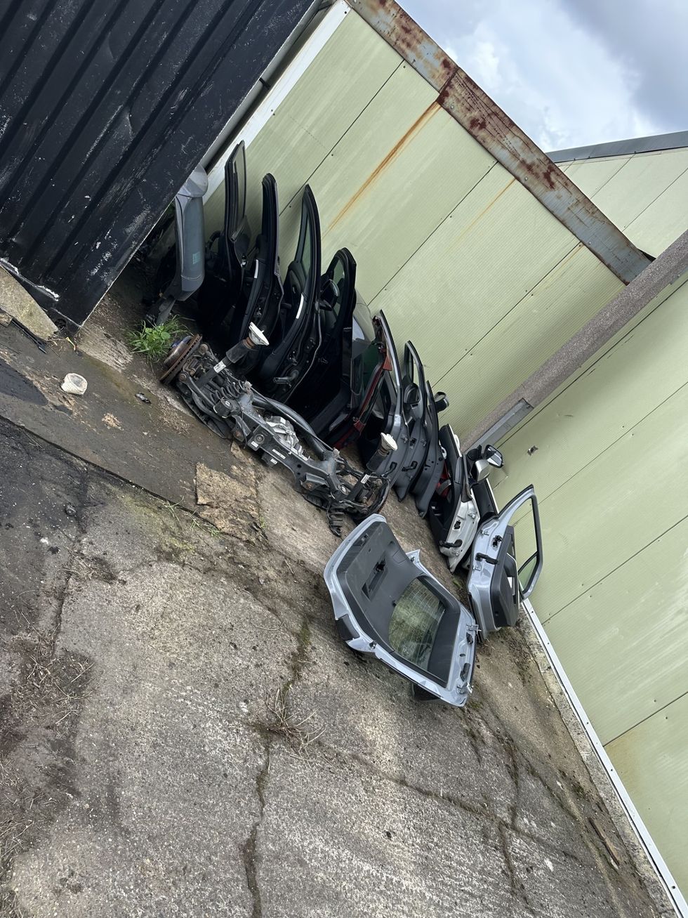 Car doors stacked up