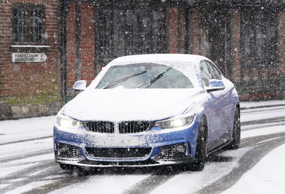 Car driving in snow
