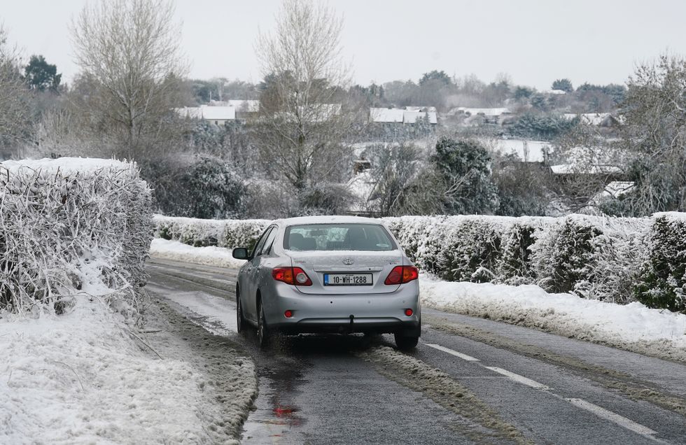 Car driving on rural road