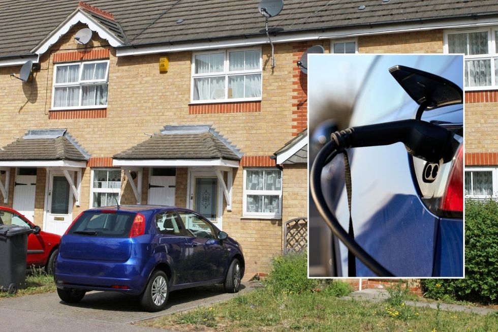 Car parked on driveway and an EV charger