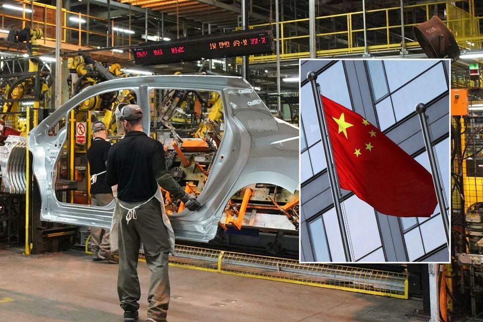 Car production facility in China and a Chinese flag