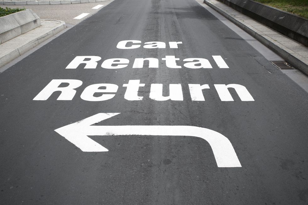 Car rental return sign