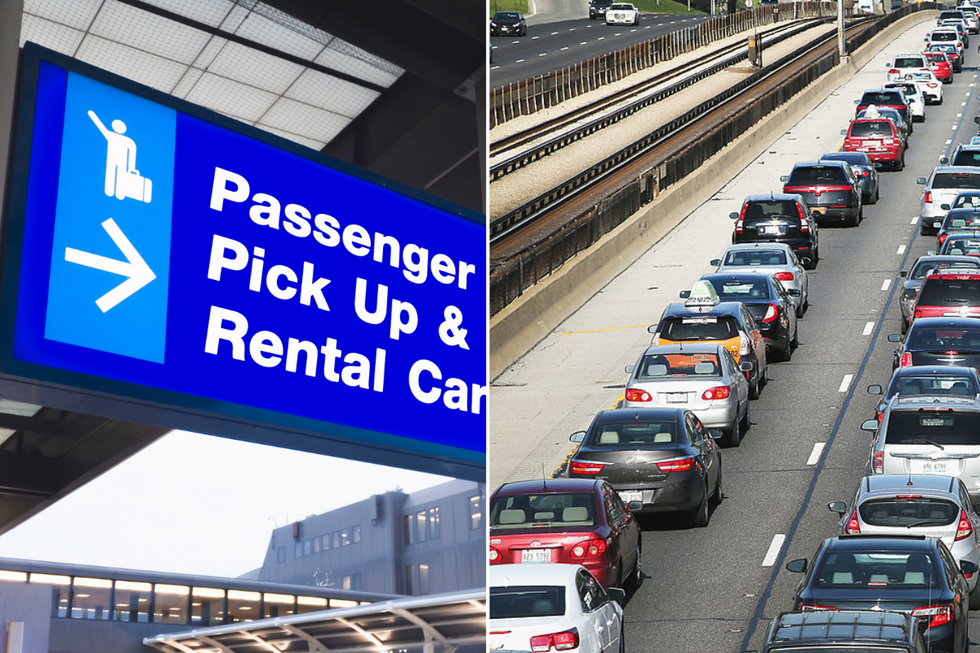 Car rental sign and a busy road 