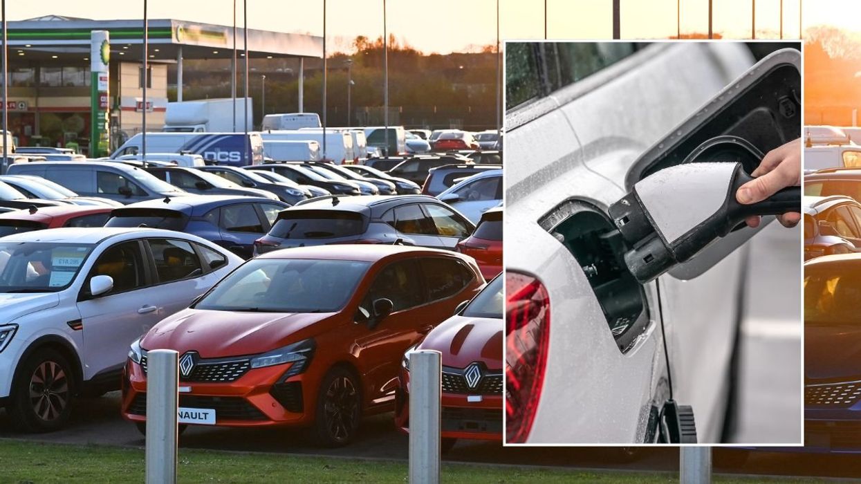 Car sales forecourt and an electric car charger