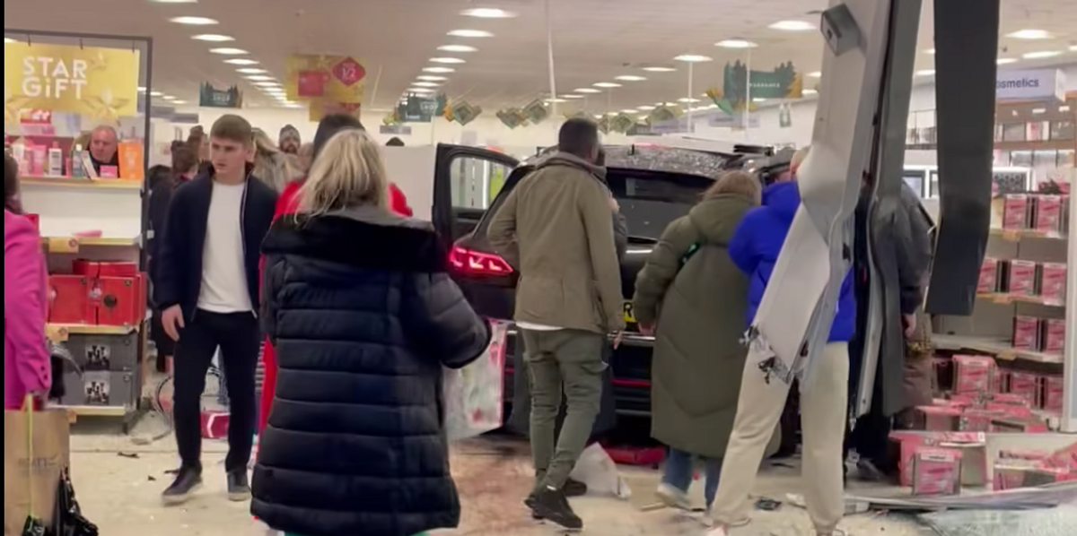 NextImg:Car leaves shoppers terrified after smashing through storefront at retail park - ‘Bedlam’