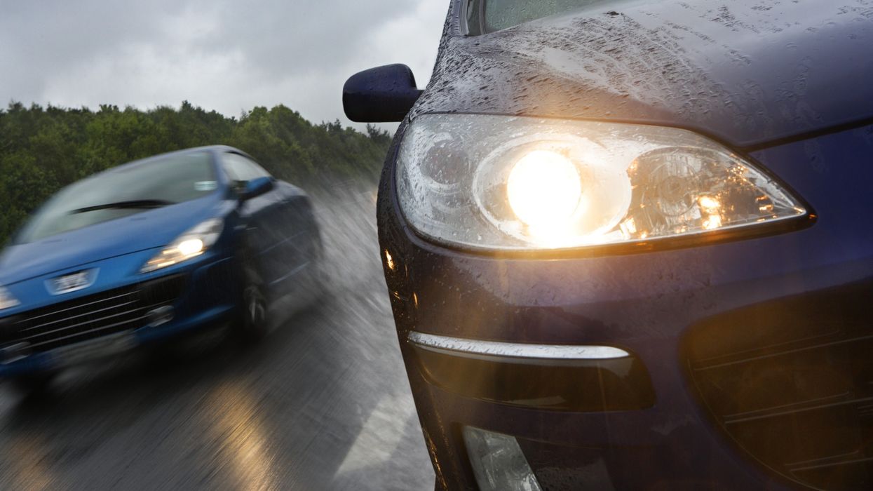 car speeding in rain