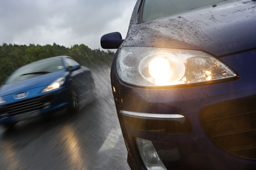 car speeding in rain
