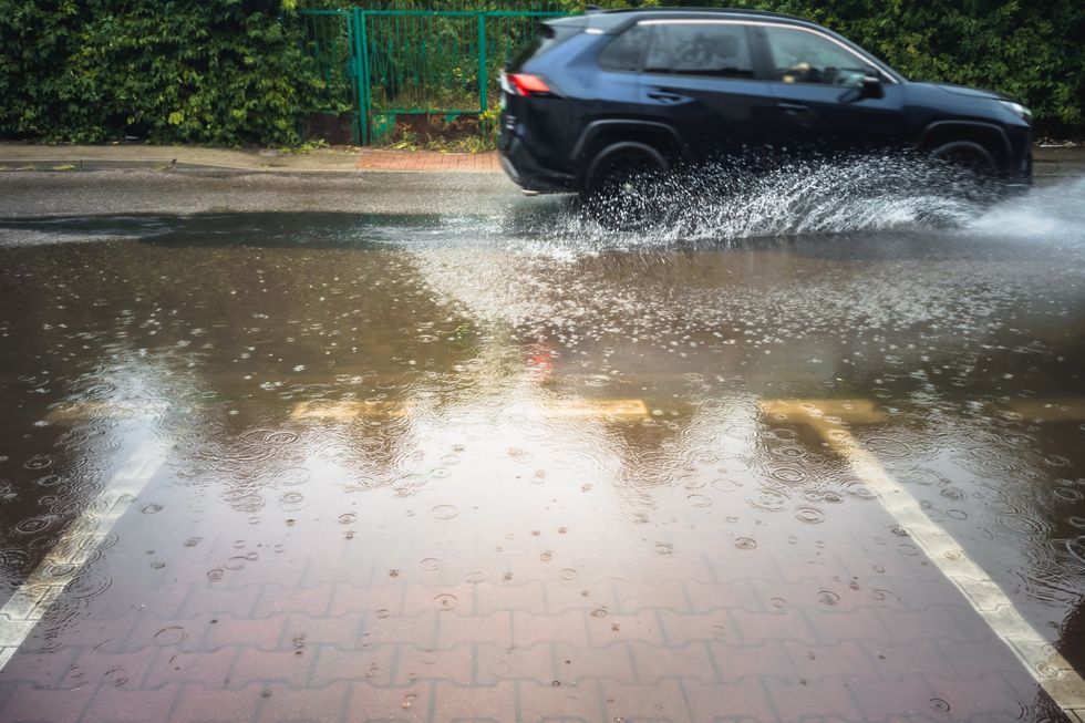 car splashing road