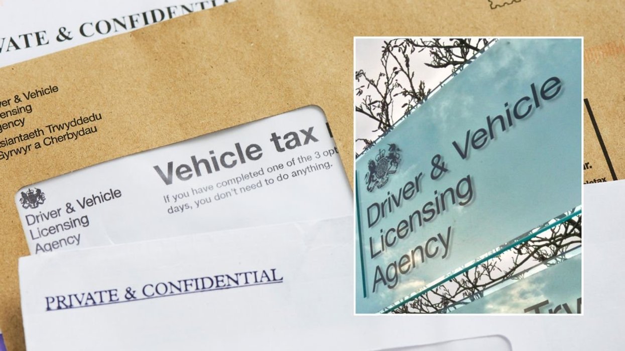 Car tax reminder letter and a DVLA sign