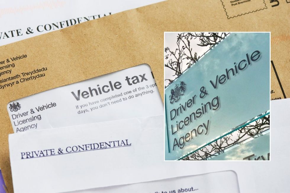 Car tax reminder letter and a DVLA sign