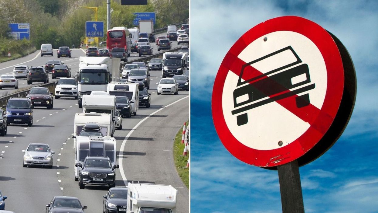 Car traffic and a car ban sign