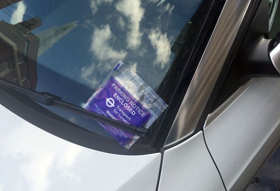 Car with a parking ticket in London