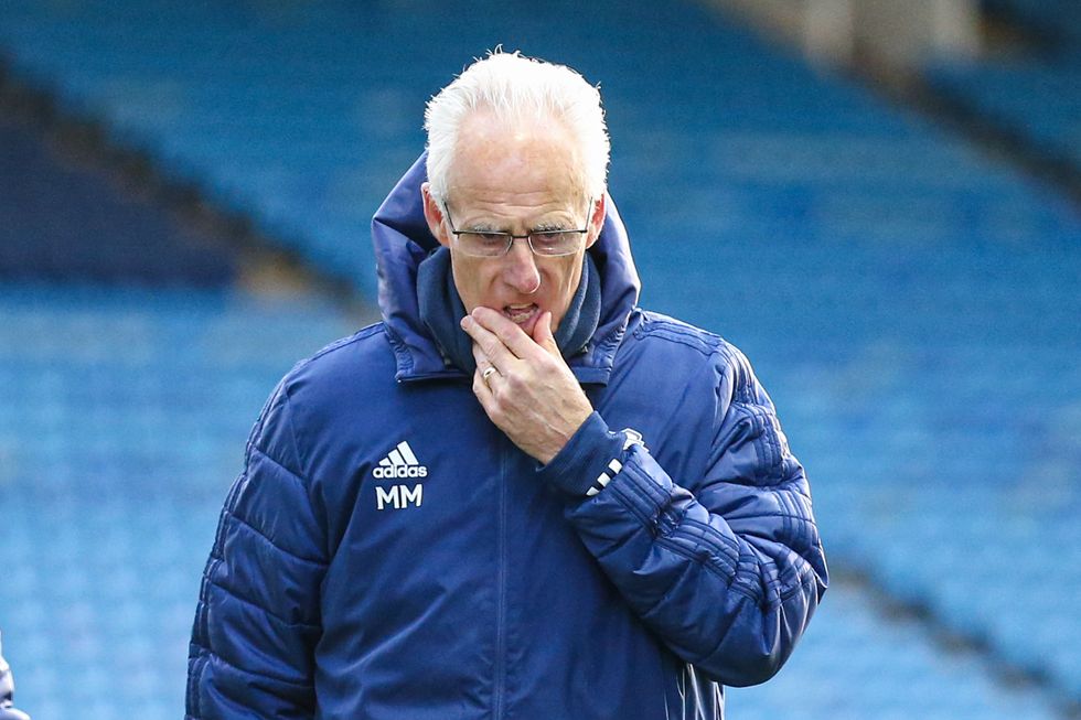 Cardiff manager Mick McCarthy has left his position, the club have announced.