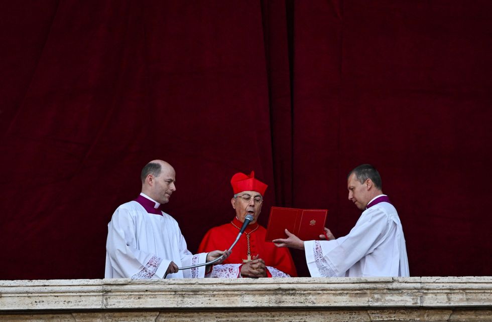 Cardinal Protodeacon Dominique Mamberti announces a new pope has been elected by the conclave at the Vatican