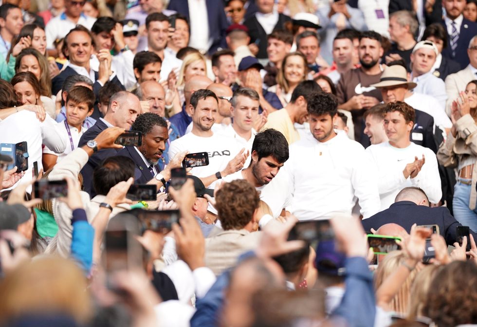 Carlos Alcaraz Wimbledon champion Novak Djokovic