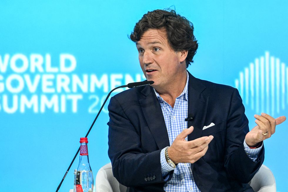 Carlson speaking at the World Government Summit in Dubai