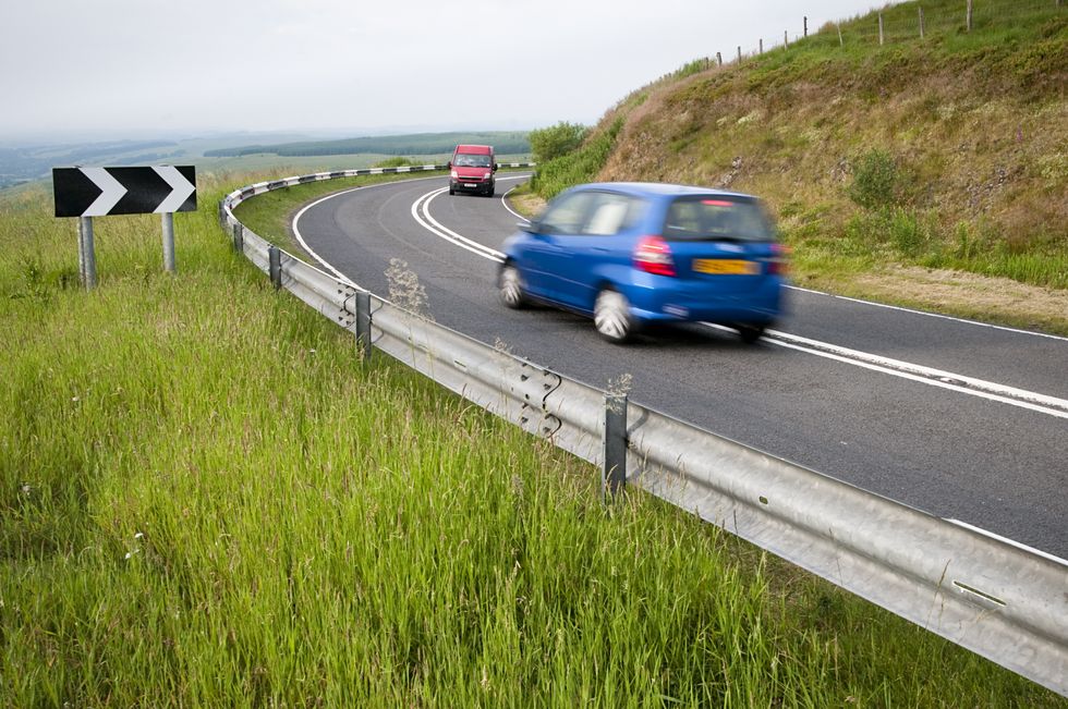 Cars driving on rural road