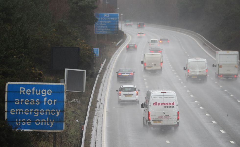 Cars driving on the motorway in the rain