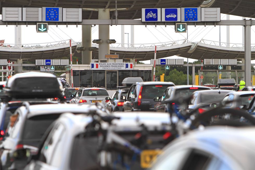 Cars driving towards the Eurotunnel between France and the UK