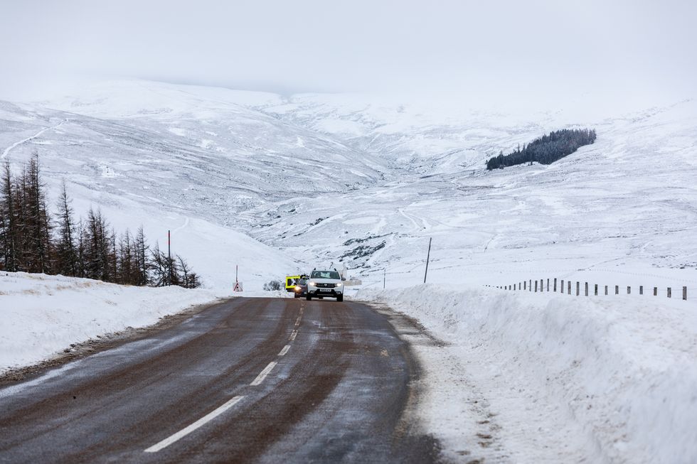 Cars make their way along the A939 after heavy snowfall in the Scottish Highlands. A yellow warning of snow and ice has been issued for northern Scotland as the Met Office said the deadly bomb cyclone that sent temperatures plunging in the US is now causing wet and windy weather in the UK. Picture date: Friday December 30, 2022.