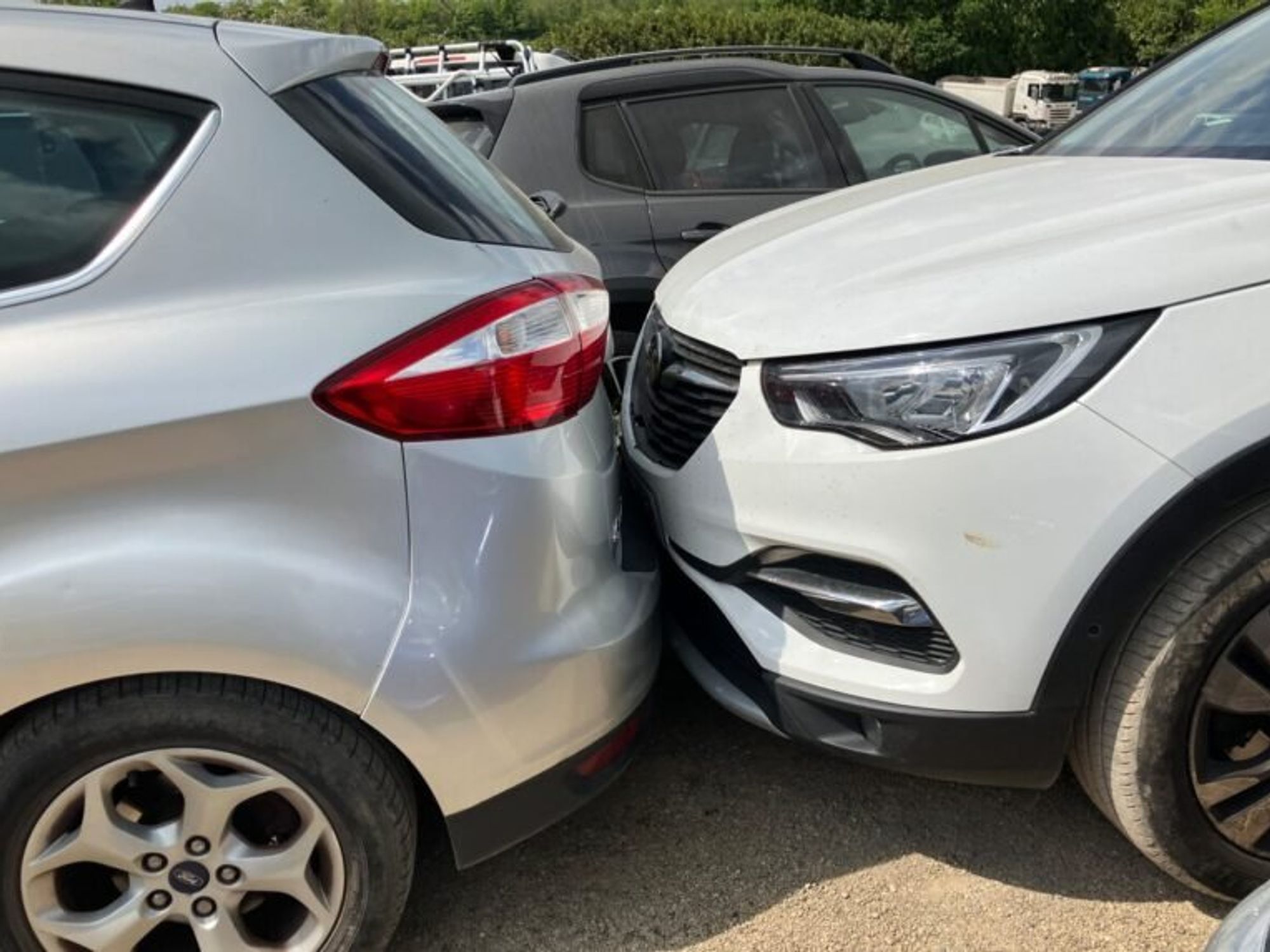 Cars packed in to too close by firm