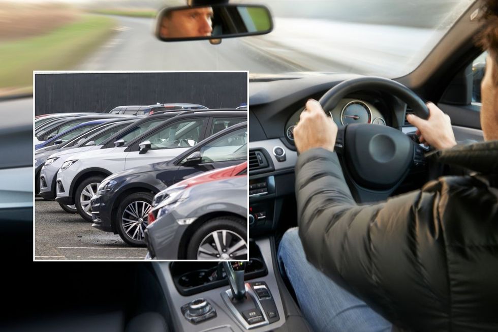 Cars parked and a man driving a car
