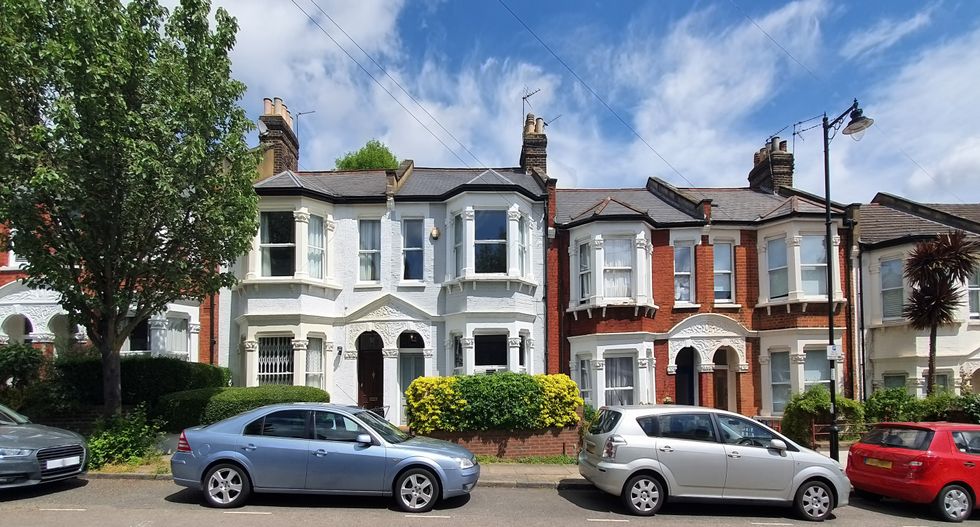 Cars parked in front of houses