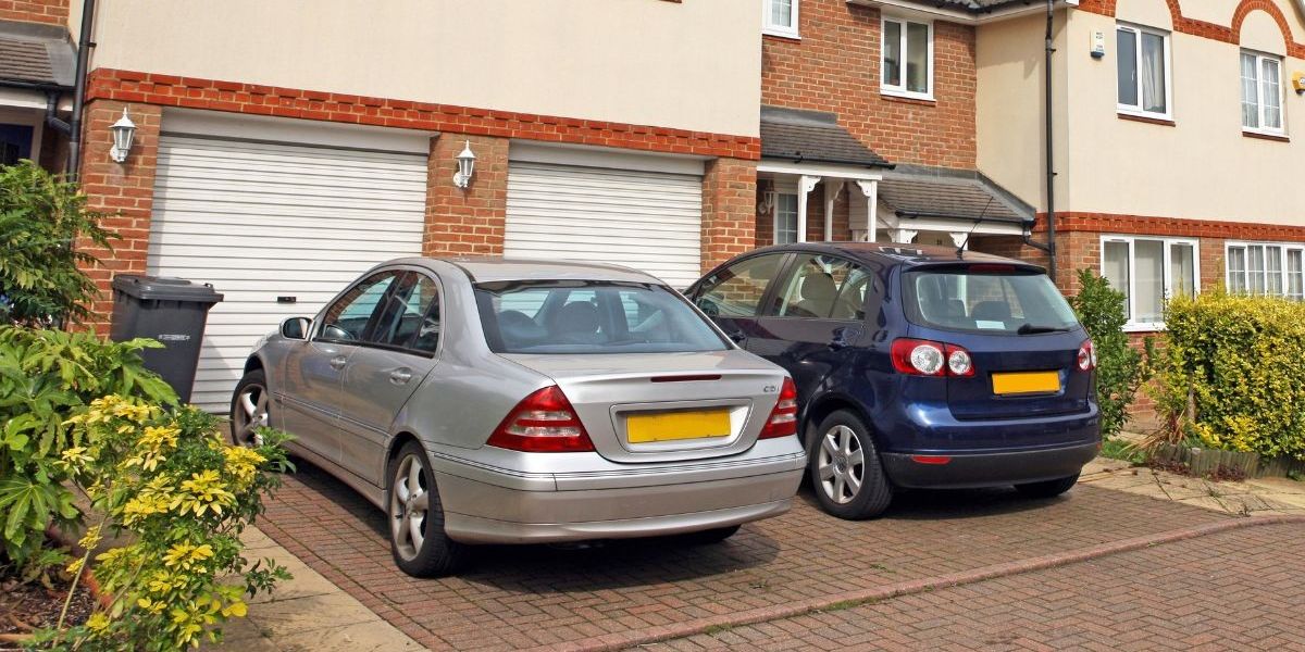 NextImg:Millions of motorists face driveway parking nightmare with cars too big to fit into garages