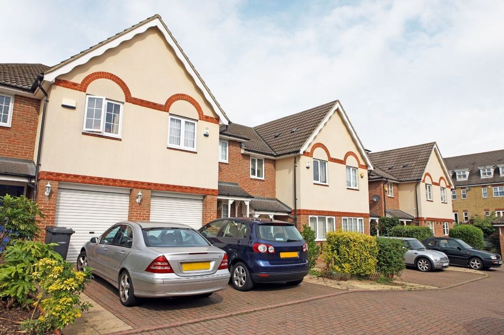 Cars parked on driveway