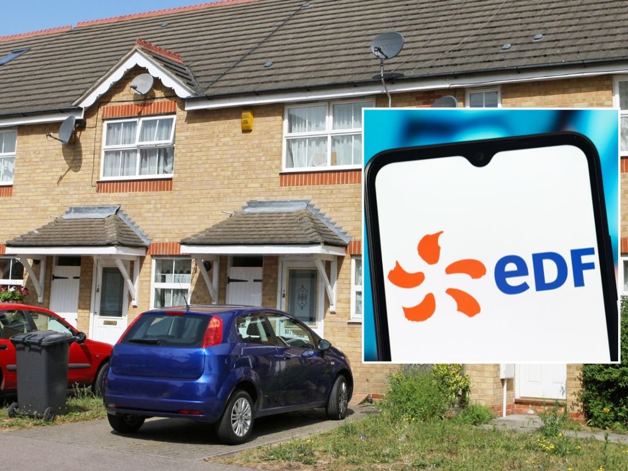 Cars parked outside a home and an EDF energy