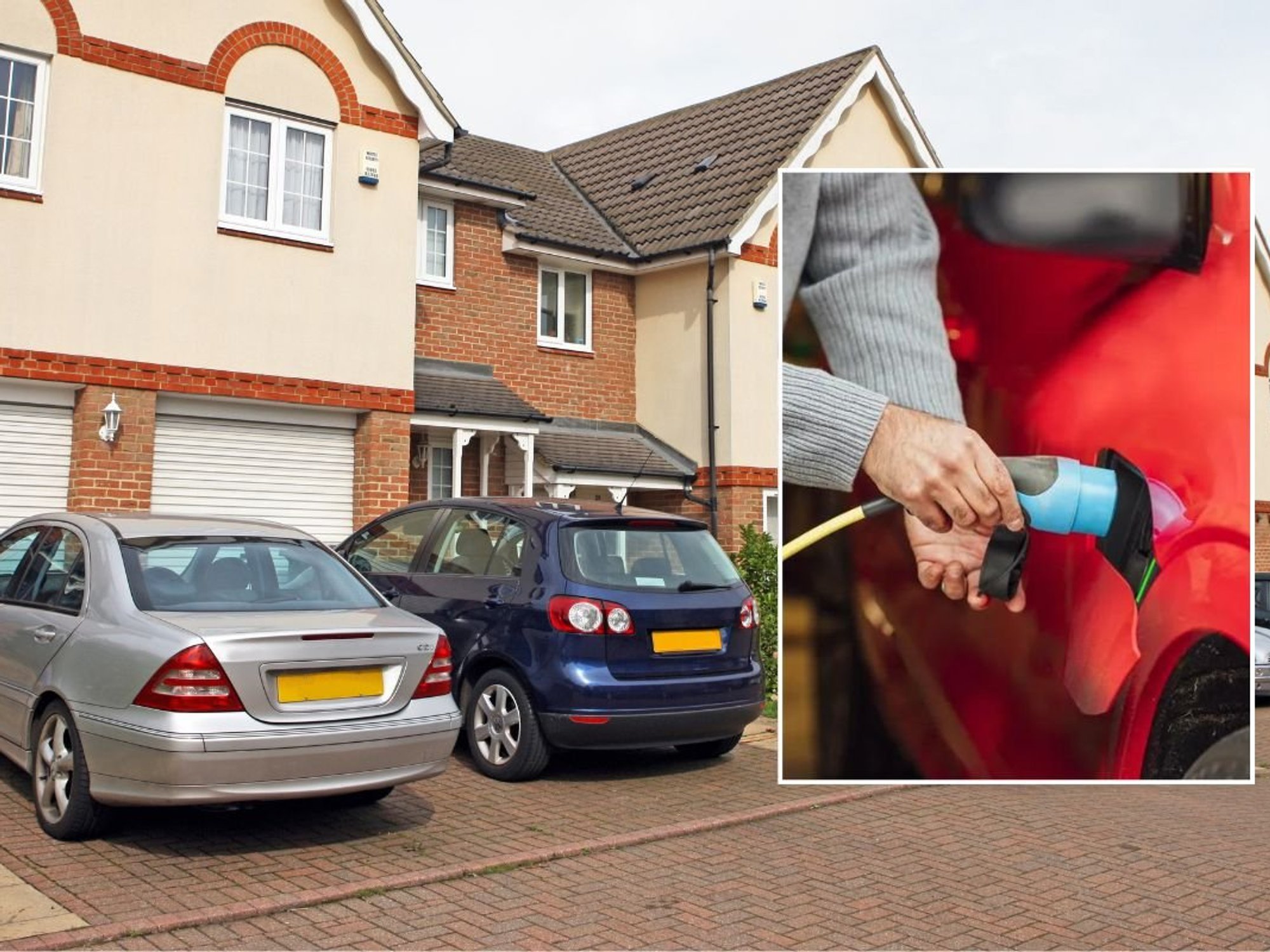 Cars parked outside a house and an electric car charger