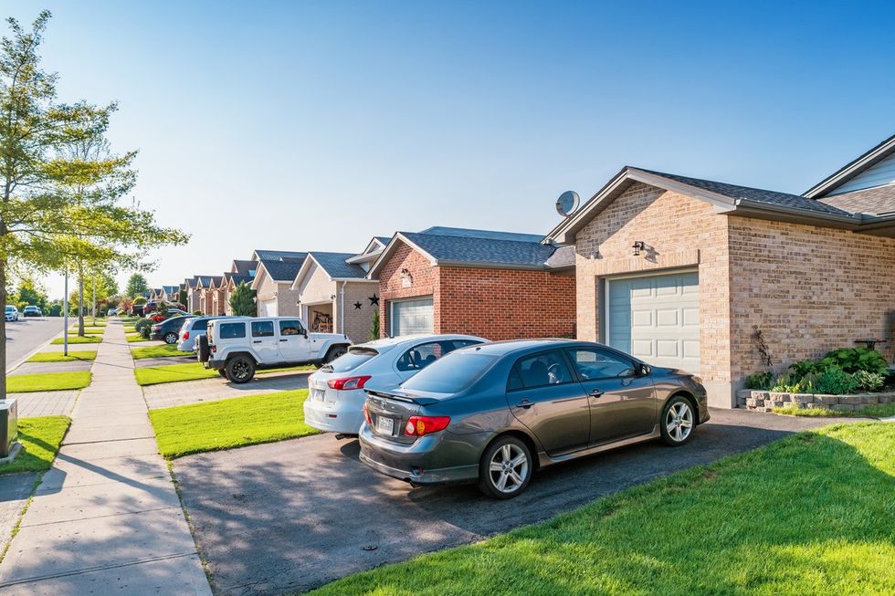 Cars parked outside houses