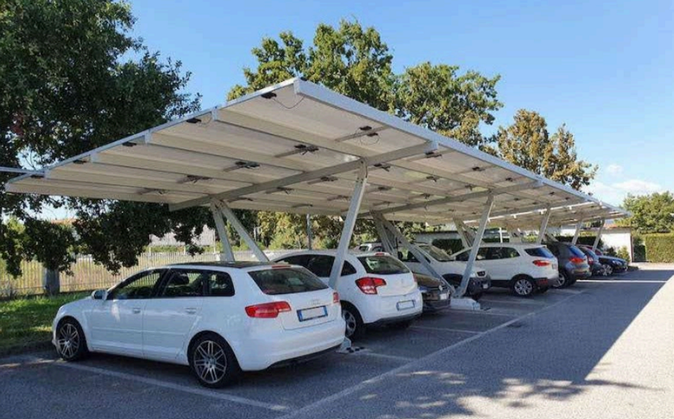 Cars parked under a solar canopy
