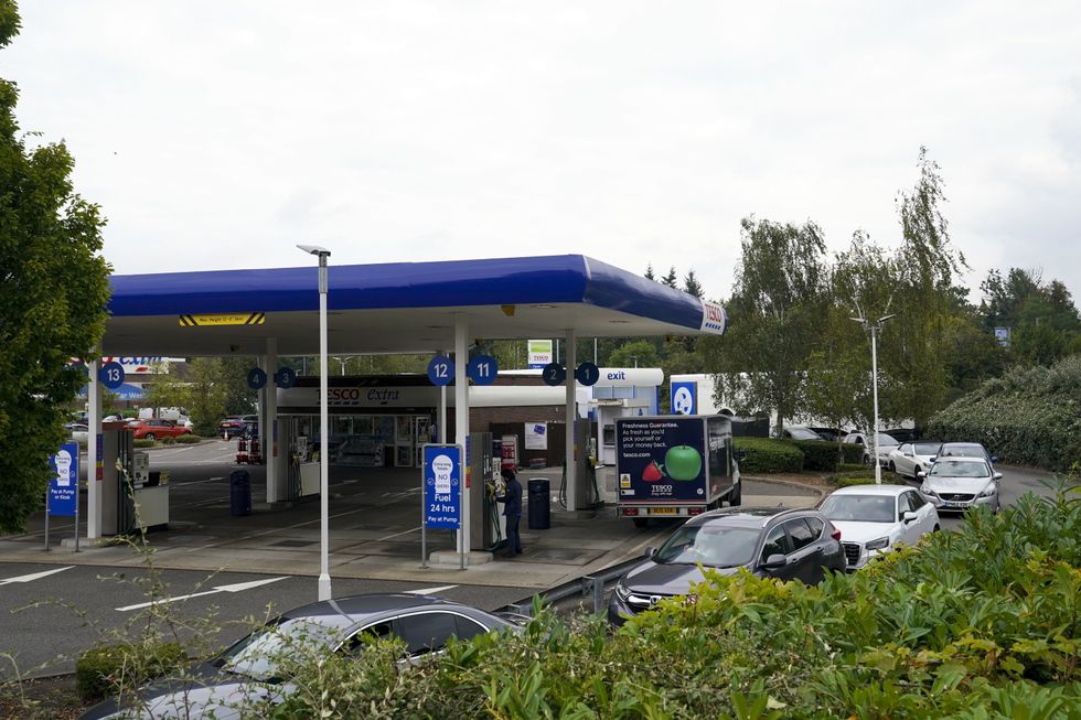 Cars queue at a Tesco petrol station in Surrey