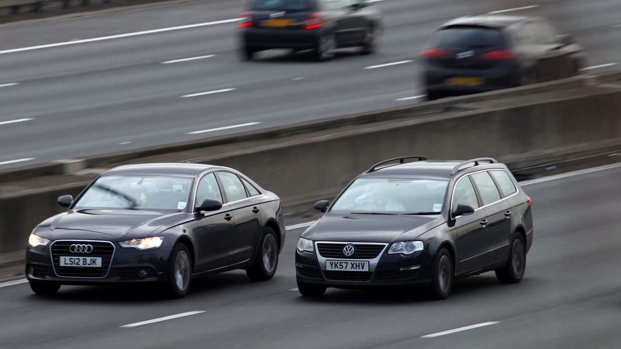 Cars travel along the M25 near Heathrow airport, London.