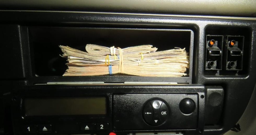 Cash found in a people smuggler's lorry