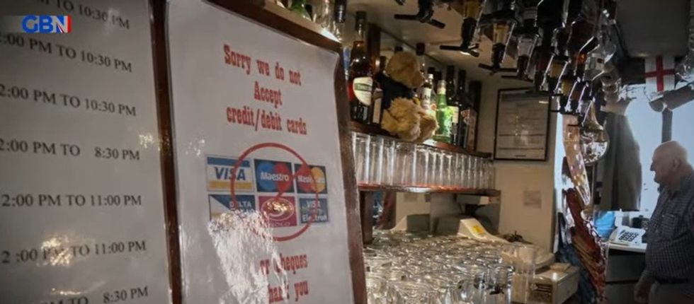 Cash-only payment sign in The Chequers Pub in Essex