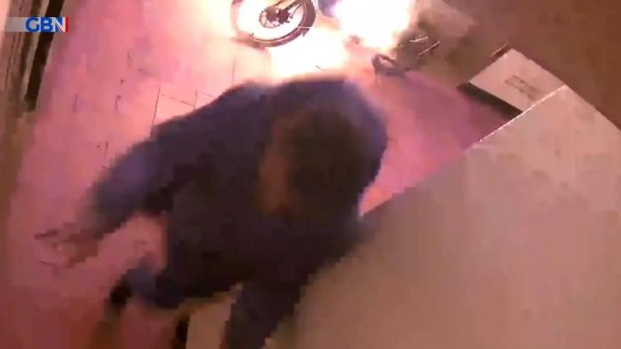 Delivery driver narrowly avoids death after bike suddenly EXPLODES - watch