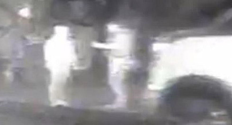 CCTV footage of Wayne Couzens speaking to Sarah Everard by the side of the road in Poynders Court, south London.