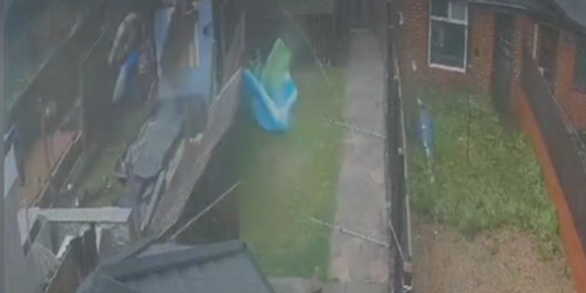 NextImg:Windows smashed and properties in disarray as CCTV captures moment tornado hits British village