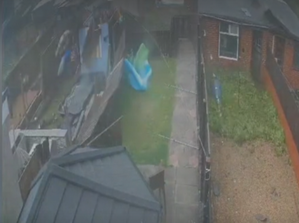 CCTV footage shows fences being blown over and properties being damaged